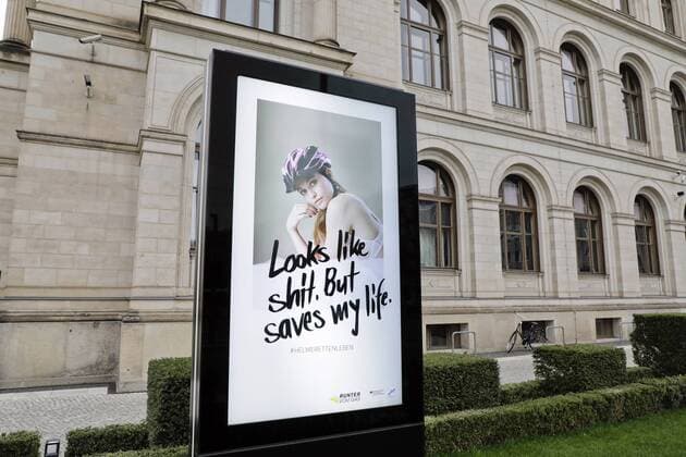 24 03 2019 Berlin Germany With a new PR campaign of the Federal Ministry of Transport, especially young people should be motivated to wear a bicycle helmet Under the title Looks like shit But saves my life Ð in German Sieht shit aus aber saves Leben (Looks like shit but saves my life