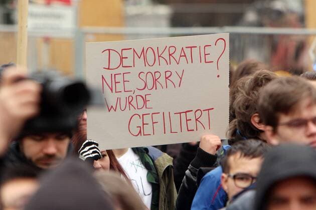 Demonstration of the party the pirates against the copyright reform of the EU European Union in Stuttgart Baden Württemberg Germany Demonstrators with poster democracy no was filtered