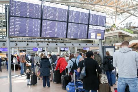 Hamburg Airport 16 04 2019 DEU Germany Hamburg Travelers waiting in queues at check-in counters at Hamburg Airport Hamburg Hamburg Germany