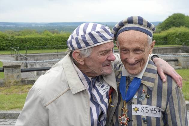 This picture shows the two survivors of the concentration camps on the left Igor Malitzkyi and on the right Eduard Mosberg in uniforms of the prisoners of that time who meet again for the celebrations 2019 Celebrations for the 74 return of the liberation of the concentration camp Mauthausen by American troops