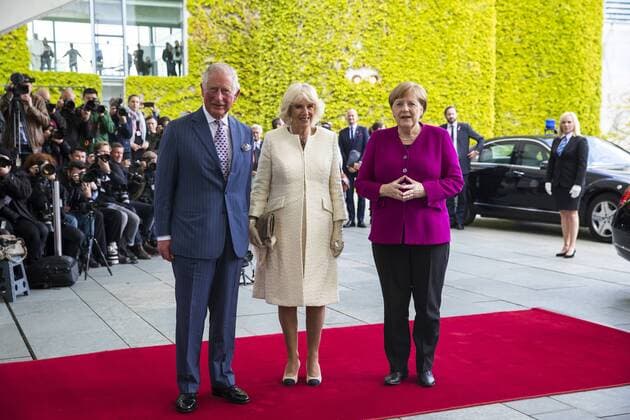 Federal Chancellor Angela Merkel poses for a picture with the Prince of Charles and Duchess of Cornwall Camilla at the Chancellery in Berlin on 7 May 2019 Prince Charles and Duchess Camilla visit Germany