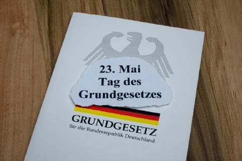 Day of the Basic Law Day of the Basic Law and Basic Law 11 05 2019 Borkwalde Brandenburg On a Basic Law lies the inscription 23 May Day of the Basic Law