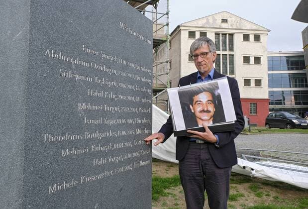 Rehearsal of a city tour on the topic of right-wing extremism in Dortmund on 27 05 19 for the Protestant Kirchentag Photo The Protestant pastor Friedrich Stiller with a photo of Copyright: epd-bild FriedrichxStark EDITORIAL USE ONLY