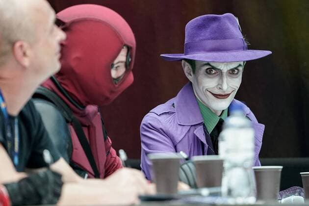 The Joker right as member of the jury at the Cosplay Contest at the Convention in the Atrium, Cosplayer kosupure , competition, fan in disguise, fans, nerds, disguise trend, science fiction, 30 06 2019, Stuttgart Germany , Event, Messe, CCON, Comic Con Germany 2019 Stuttgart xozx