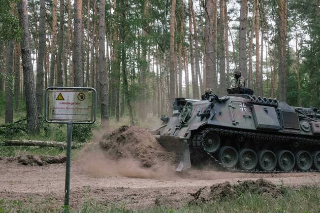 03 07 2019 Tank drives for press over tree Forest fire on former military training area near Lübtheen In Lübtheen, near Schwerin, several hundred hectares of forest have been burning since Sunday 30 06 19 Fire brigade, police and Bundeswehr are trying to get the fire under control on a former military training area Several villages had to be evacuated Copyright: xMichaelxTrammerx