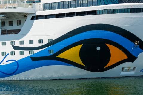 Di AIDA prima of the AIDA Cruises at the Ostseekai in Kiel, at the same time with the sister ship AIDA cara at the Ostseekai in front of the Kieler Schloss and the Kiellinie Kiel Schleswig Holstein Germany