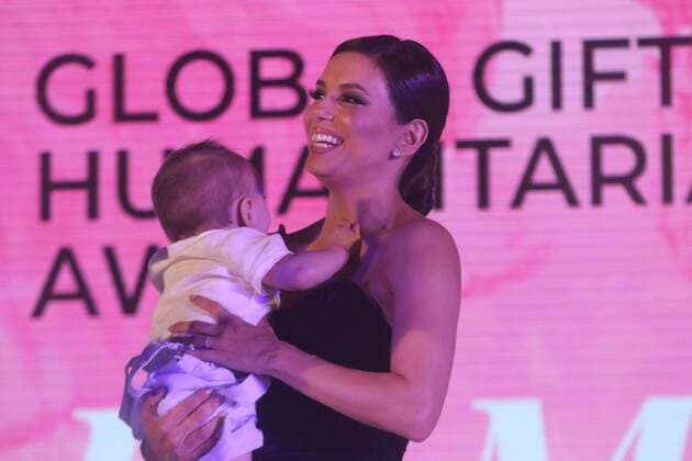 Eva Longoria with her son inside the Global Gift gala in Marbella, July 12 2019 Cordon Press  FOTOSxLORENZOxCARNERO CORDONPRESS