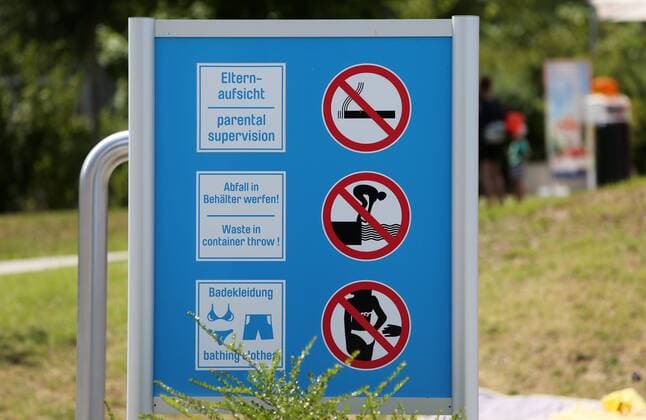Erfurt 21 07 2019 , Erfurt, Nordbad, Freibad, signs refer to the rules in swimming pools Swimwear, throw waste into containers, do not jump from the edge of the pool, do not touch women, do not smoke
