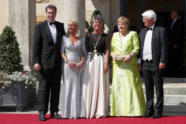 Opening of the 108 Richard Wagner Festspiele in Bayreuth with the production of Richard Wagners opera Tannhäuser Promis goes over the red carpet to the Königsportal of the Festspielhaus in Bayreuth Dr Markus Söder Prime Minister of Bavaria with wife Karin Baumüller Söder , Dr Angela Merkel Chancellor of the Federal Republic of Germany , Brigitte Merk Erbe Lord Mayor of Bayreuth with husban