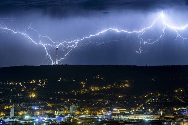 Lightning spectacle over the Stuttgart television tower in the night Stuttgart, Bismarck Tower Copyright: xSimonxAdomatx