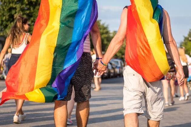 Christopher Street Day in Berlin Germany, Berlin 27 07 2019 In the picture two participants holding hands after the CSD Berlin Berlin Germany