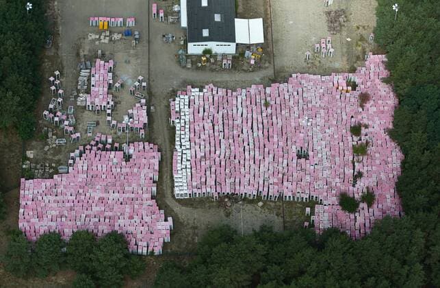 Aerial photos MICHENDORF, 04 08 19, Collection point for telephone booths Telekom site pink telephone booths are stored in a forest near Michendorf and are available for sale Phone booths Cemetery