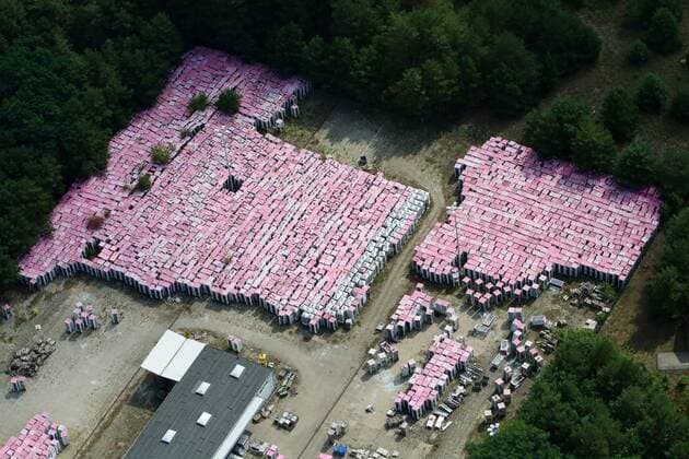 Aerial photos MICHENDORF, 04 08 19, Collection point for telephone booths Telekom site pink telephone booths are stored in a forest near Michendorf and are available for sale Phone booths Cemetery