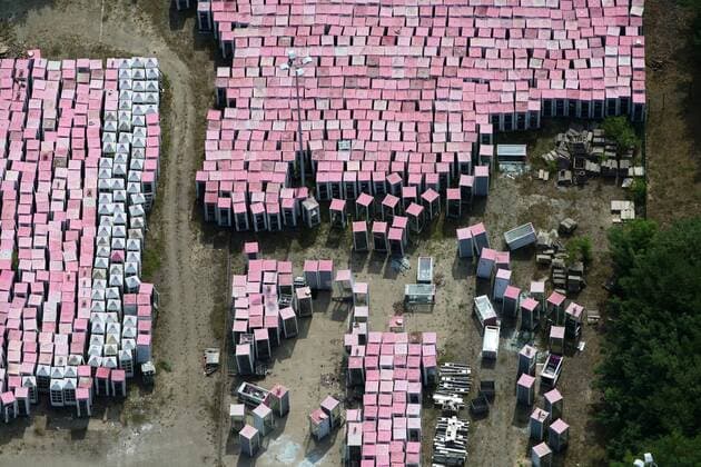 Aerial photos MICHENDORF, 04 08 19, Collection point for telephone booths Telekom site pink telephone booths are stored in a forest near Michendorf and are available for sale Phone booths Cemetery