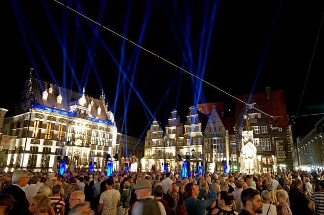 The Bremer Marktplatz on the opening evening for the 30 Musikfest Bremen on 24 August 2019 under the motto A great night music Links of the Chamber of Commerce Sitz Schütting, on the right in front of the German House the Roland Statue
