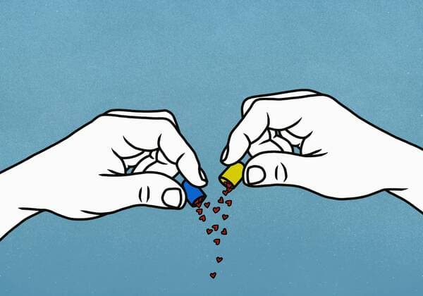 Hearts spilling from open medicine capsule  Copyright: MaltexMueller fStopImages1834040