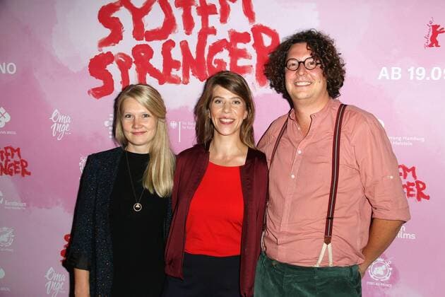 The two producers Frauke Kolbmüller and Jonas Weydemann with director Nora Fingscheidt at the Systemsprenger Film Premiere on 9 09 2019 in Hamburg Systemsprenger Film Premiere in Hamburg
