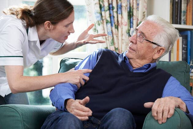 Care Worker Mistreating Senior Man At Home,model released, Symbolfoto,property released ING_39524_02489