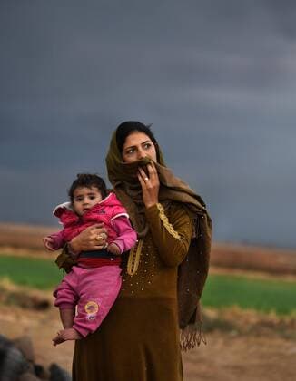 News Bilder des Tages October 29, 2019, Tel Tamir, Syria: IDPs, Internally Displaced Persons, that fled the conflict with Turkey in Syria and also local village residents receive food, water and blankets from Free Burma Rangers on October 29, 2019 in a neighborhood near the front line. Dave Eubank from Free Burma Rangers stated â€oeCall it Turkish zone of invasion, zone of genocide, ethnic cleansing…anything but a safe zone.â€Â.From an FBR tweet: â€oeThis zone is one of ethnic cleansing with 300,000 people displaced. Many have been killed and wounded. Homes are destroyed. The Kurds are calling this area â€oethe genocide zone.†The safe zone is not safe by any definition. It is the zone of the Turkish invasion. Weâ€⠢ve seen their tanks and been fired upon by those tanks and their aircraft. There has been no ceasefire this whole ti - ZUMAg208 20191029_zap_g208_003 Copyright: xCarolxGuzyx