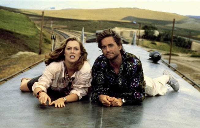 Kathleen Turner & Michael Douglas Characters: Joan Wilder & Jack Colton Film: The Jewel Of The Nile (1985) Director: Lewis Teague 11 December 1985  Copyright: MaryxEvansxAFxArchivex20xCenturyxFox 12466523 editorial use only