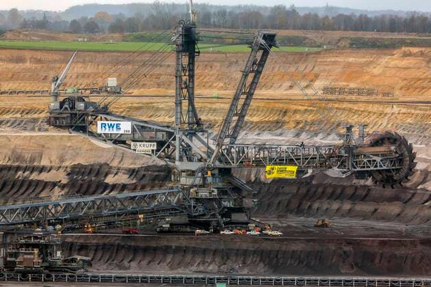 Activists of environmental protection organisation Greenpeace have occupied a bucket wheel excavator of energy company RWE at the Garzweiler lignite opencast mine near Jüchen NRW in the Rhineland and demand immediate exit of coal Greenpeace occupied excavator