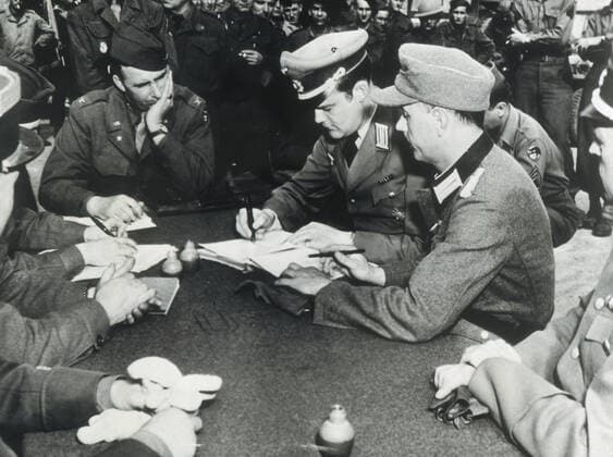 Landing in June 1944 Signing of the German surrender in Saint Nazaire on May 8, 1945 On the right, General Werner Junk, commander of the German garrison in St Nazaire on the left Colonel John W Koating, head of the 66th American Division, and Major General Horman F Krammer, head of the 66th Allied Division Credit Collection NB Kharbine Tapabor  KH28175