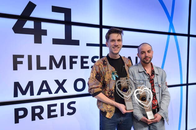 The prizes at the Max Ophüls Film Festival will be awarded on Saturday 25 01 2020 at the E Werk in Saarbrücken A total of 16 prizes will be awarded, including best film and best actors After the award ceremony, the guests will celebrate in high spirits at the film party Best feature film will be Neubau by Johannes Maria Schmit li At the same time, Tucke Royale re w bub