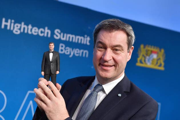 Markus SOEDER State Premier of Bavaria and CSU Chairman holds a 3D figure of himself At the invitation of State Premier Dr Markus Soeder, experts in the field of future technologies meet at the High-Tech Summit Bavaria AI, Artificial Intelligence On 03 02 2020 Technische Universitaet Muenchen TUM in Garching