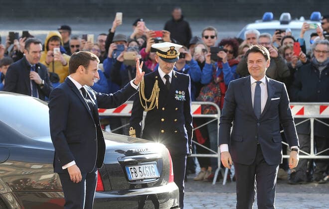 French President Emmanuel Macron waves to people (L) next to Italian Prime Minister Giuseppe Conte as arriving at the Royal Palace, venue of the XXXV Italian-French Summit  Copyright: xCarloxHermannx xIPAx xKontrolabx