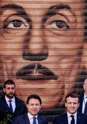 French President Emmanuel Macron, visiting Naples for the Italian-French summit, arrives at the San Ferdinando theater with the Italian Prime Minister, Giuseppe Conte. Behind them a mural of the famous Italian playwright Eduardo De FIlippo.  Copyright: xSalvatorexLaportax xIPAx xKontrolabx