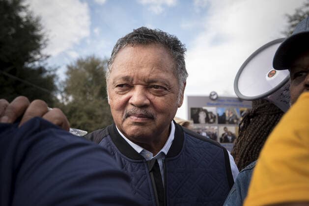March 1, 2020, Selma, AL, USA: Celebrating the 55th anniversary of the Ã Bloody Sunday civil rights march across the Edmund Pettus Bridge..Pictured: Civil rights legend Jesse Jackson holds onto should of a security guard to keep from falling as he greets marchers outside Brown AME chapel. Selma USA - ZUMAn03_ 20200301_zaf_n03_027 Copyright: xRobinxRaynex