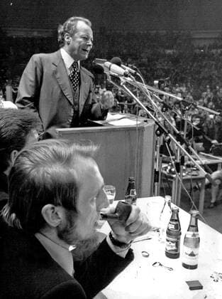 SPD party leader and former Chancellor Willy Brandt on 14 March 1975 at a campaign rally in Kiels Ostseehalle for the state elections in Schleswig Holstein In the foreground SPD top candidate Klaus Matthiesen 1941 1998 From 1973 to 1983 Matthiesen was SPD pa