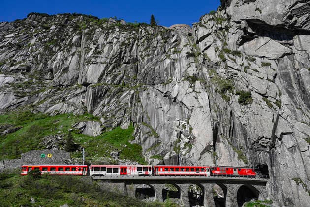 Matterhorn Gotthard Railway on the Steinbrücke, exit Urnerloch, Switzerland, 25 05 2020