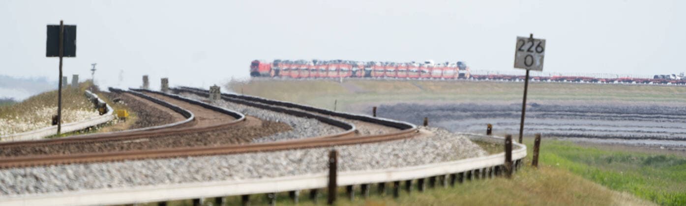 Deutsche Bahn AG Sylt Shuttle on Hindenburgdamm on the island Sylt View from the island in direction Wadden Sea Car train Car train DB diesel locomotive Diesel locomotive Diesel locomotive