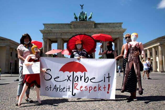 DEU, Germany, Germany, Berlin, 02 06 2020 Women with banner Sex work is work Respect for more rights of women working inside the sex industry in Berlin, Ger
