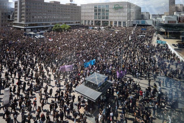 06 06 2020, Berlin Germany People gather for the Silent Demo at Alexanderplatz to protest against police violence because of the death of African-American George Floyd
