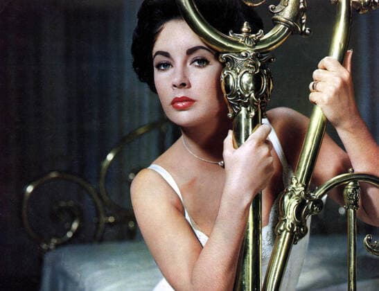 CAT ON A HOT TIN ROOF CAT ON A HOT TIN ROOF ELIZABETH TAYLOR CAT ON A HOT TIN ROOF Date: 1958. Strictly editorial use only in conjunction with the promotion of the film. Credit line mandatory. This image is copyright of the film company and is supplied under the terms of issue as film still. No commercial or book cover use permitted without prior consent from the film company.  Mandatory credit line: Image courtesy MGM Ronald Grant Archive Mary Evans