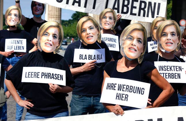Weve had enough Protest against agricultural policy Under the slogan Weve had enough and with masks of Federal Minister of Agriculture Julia Kloeckner environmental activists demonstrate at the Brandenburg Gate against the agricultural policy of the Federal Government Berlin Berlin Germany