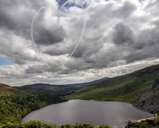 EDITORIAL USE ONLY Red Bull Matadors Aerobatic Display Over The East Coast of Ireland 2 7 2020 Pictured today at Lough Tay, the Red Bull Matadors piloted by Paul Bonhomme & Steve Jones, took to the skies to perform a thrilling aerobatic display along the east coast of Ireland GivesYouWings The Red Bull Matadors 2 7 2020  Copyright: x INPHO MorganxTreacyx 0047500538st
