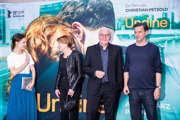German President Frank Walter Steinmeier 2R , his wife Elke Buedenbender 2L , actress Paula Beer L and director Christian Petzold R at the screening of the film Undine at the Delphi Filmpalast in Berlin on July 2, 2020 As of today, cinemas can reopen to the public, subject to distance and hygiene measures Reopening of cinemas in Berlin