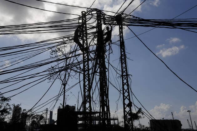 September 9, 2020, Beirut, Beirut, Lebanon: Lebanese workers repairs the power line which was disrupted by a blast in Beirut s port area, Lebanon August 9, 2020, in the aftermath of a colossal explosion that occurred days prior due to a huge pile of ammonium nitrate that had languished for years at a port warehouse. The huge chemical explosion that hit Beirut s port, devastating large parts of the Lebanese capital and claiming over 150 lives, left a 43-metre (141 foot) deep crater, a security official said. The blast Tuesday, which was felt across the country and as far as the island of Cyprus, was recorded by the sensors of the American Institute of Geophysics (USGS) as having the power of a magnitude 3.3 earthquake Beirut Lebanon - ZUMAap3_ 20200909_zaf_ap3_015 Copyright: xMarwanxTahtahx