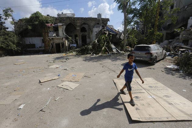 September 9, 2020, Beirut, Beirut, Lebanon: Lebanese child walks near the site of blast in Beirut s port area, Lebanon on August 9, 2020, in the aftermath of a colossal explosion that occurred days prior due to a huge pile of ammonium nitrate that had languished for years at a port warehouse. The huge chemical explosion that hit Beirut s port, devastating large parts of the Lebanese capital and claiming over 150 lives, left a 43-metre (141 foot) deep crater, a security official said. The blast Tuesday, which was felt across the country and as far as the island of Cyprus, was recorded by the sensors of the American Institute of Geophysics (USGS) as having the power of a magnitude 3.3 earthquake Beirut Lebanon - ZUMAap3_ 20200909_zaf_ap3_018 Copyright: xMarwanxTahtahx