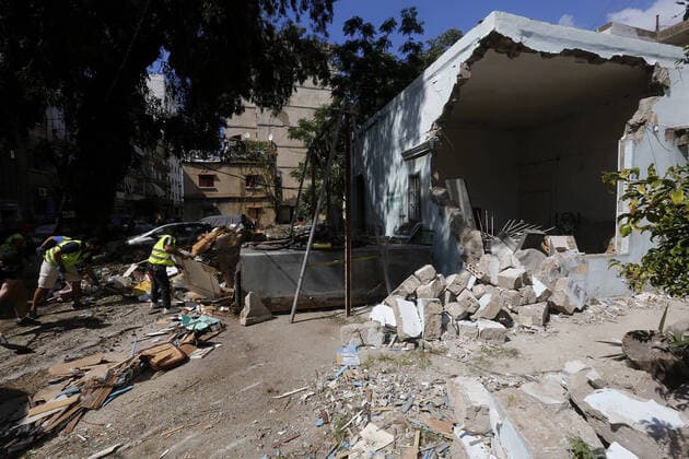 September 9, 2020, Beirut, Beirut, Lebanon: Lebanese workers clear debris near the site of blast in Beirut s port area, Lebanon on August 9, 2020, in the aftermath of a colossal explosion that occurred days prior due to a huge pile of ammonium nitrate that had languished for years at a port warehouse. - The huge chemical explosion that hit Beirut s port, devastating large parts of the Lebanese capital and claiming over 150 lives, left a 43-metre (141 foot) deep crater, a security official said. The blast Tuesday, which was felt across the country and as far as the island of Cyprus, was recorded by the sensors of the American Institute of Geophysics (USGS) as having the power of a magnitude 3.3 earthquake Beirut Lebanon - ZUMAap3_ 20200909_zaf_ap3_019 Copyright: xMarwanxTahtahx