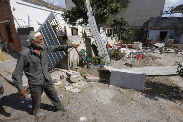 September 9, 2020, Beirut, Beirut, Lebanon: Lebanese man inspects the damaged building near the site of blast in Beirut s port area, Lebanon on August 9, 2020, in the aftermath of a colossal explosion that occurred days prior due to a huge pile of ammonium nitrate that had languished for years at a port warehouse. The huge chemical explosion that hit Beirut s port, devastating large parts of the Lebanese capital and claiming over 150 lives, left a 43-metre (141 foot) deep crater, a security official said. The blast Tuesday, which was felt across the country and as far as the island of Cyprus, was recorded by the sensors of the American Institute of Geophysics (USGS) as having the power of a magnitude 3.3 earthquake Beirut Lebanon - ZUMAap3_ 20200909_zaf_ap3_021 Copyright: xMarwanxTahtahx