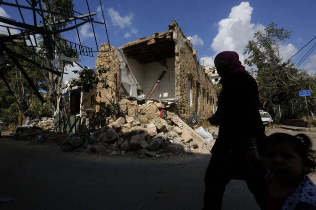 September 9, 2020, Beirut, Beirut, Lebanon: Lebanese walk beside the rubble near the site of blast in Beirut s port area, Lebanon August 9, 2020, in the aftermath of a colossal explosion that occurred days prior due to a huge pile of ammonium nitrate that had languished for years at a port warehouse. The huge chemical explosion that hit Beirut s port, devastating large parts of the Lebanese capital and claiming over 150 lives, left a 43-metre (141 foot) deep crater, a security official said. The blast Tuesday, which was felt across the country and as far as the island of Cyprus, was recorded by the sensors of the American Institute of Geophysics (USGS) as having the power of a magnitude 3.3 earthquake Beirut Lebanon - ZUMAap3_ 20200909_zaf_ap3_026 Copyright: xMarwanxTahtahx