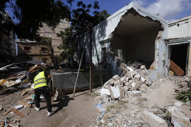 September 9, 2020, Beirut, Beirut, Lebanon: Lebanese workers clear debris near the site of blast in Beirut s port area, Lebanon on August 9, 2020, in the aftermath of a colossal explosion that occurred days prior due to a huge pile of ammonium nitrate that had languished for years at a port warehouse. - The huge chemical explosion that hit Beirut s port, devastating large parts of the Lebanese capital and claiming over 150 lives, left a 43-metre (141 foot) deep crater, a security official said. The blast Tuesday, which was felt across the country and as far as the island of Cyprus, was recorded by the sensors of the American Institute of Geophysics (USGS) as having the power of a magnitude 3.3 earthquake Beirut Lebanon - ZUMAap3_ 20200909_zaf_ap3_027 Copyright: xMarwanxTahtahx