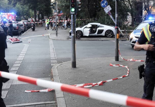 Apparently because of excessive speed the driver of this Audi sports car crashed into a traffic sign at the corner of Fichtestraße Urbanstraße in Berlin Kreuzberg and came to a halt on the sidewalk Speeding accident in Kreuzberg