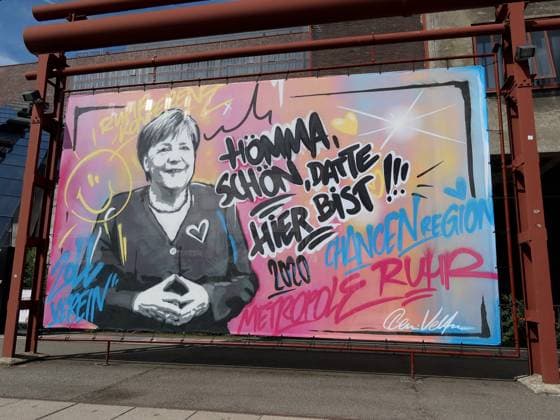 BUNDESKANZLERIN DR ANGELA MERKEL visits the federal state of North Rhine-Westphalia NRW ,a poster on the Zeche Zollverein in Essen,city in the Ruhr area,greeted,the Chancellor with Hömma,BEAUTIFUL DATE HERE,photographed on 18 08 2020 Chancellor Angela Merkel is expected at Zeche Zollverein at about 16 oclock Â