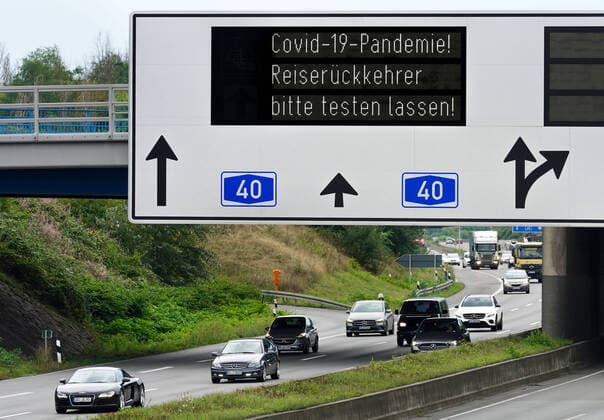 Dortmund, 21 8 2020 Invitation to travel returnees to have themselves tested for the corona virus due to the Covid 19 pandemic Sign gantry on the A40 motorway in the Dortmund area