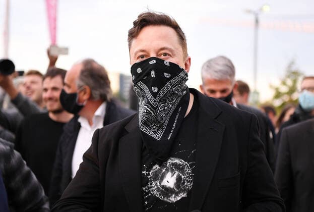 Tuebingen 01 09 2020 Tesla boss Elon Musk with mask on foot in the technology park in Tuebingen at the biopharma company Curevac, surrounded by fans and media